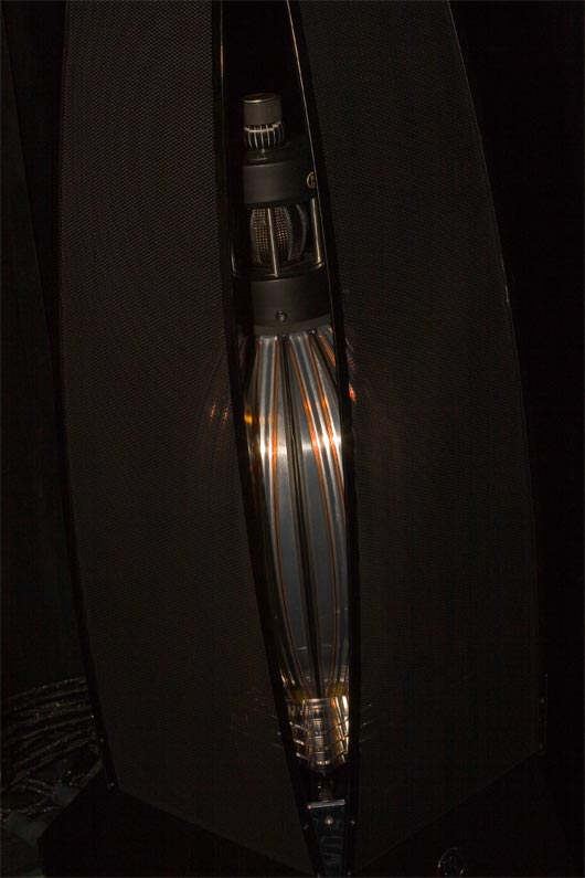 MBL 101E loudspeaker up close with colored spotlight