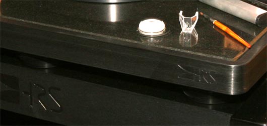 Close up of how the feet of the special HRS platform for the Brinkmann sit in the troth on the steel rails